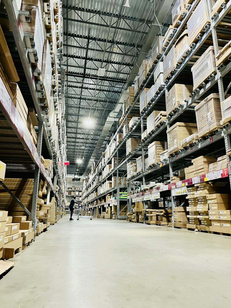 Warehouse shelves filled with cardboard boxes